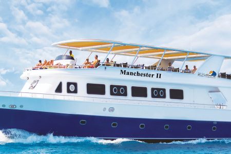luxury trip to Orange Bay with Lunch on a classic boat
