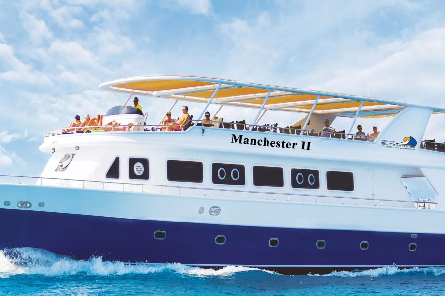 luxury trip to Orange Bay with Lunch on a classic boat